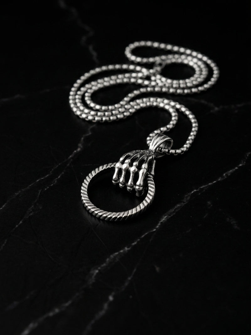 SKELETAL GRIP PENDANT